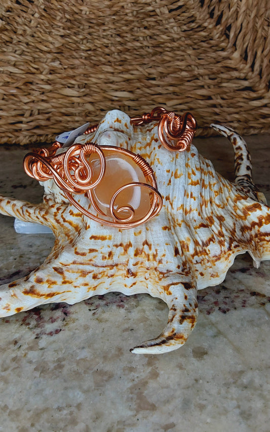 Handmade Copper Wire-Wrapped Bracelet with Peach Moonston